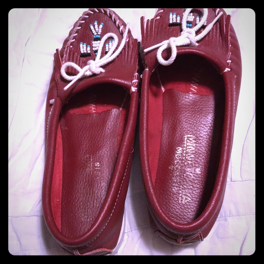 Red leather Minnetonka moccasins